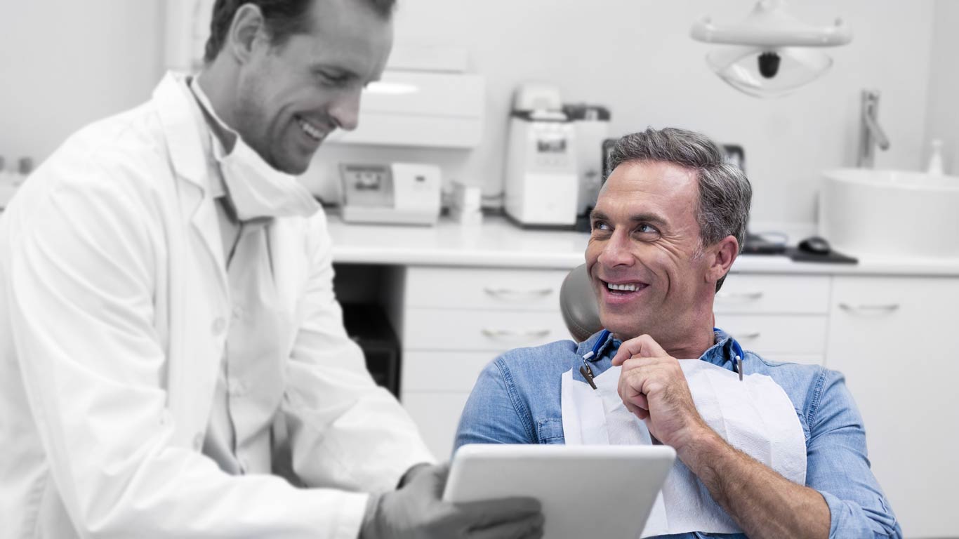 Man smiling after having Endodontic Retreatment